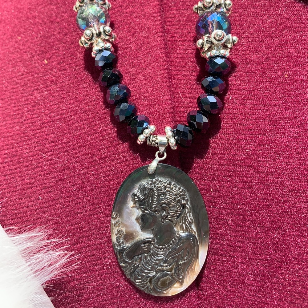 Abalone shell carved cameo pendant